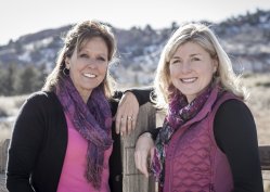 lori and becky by fence