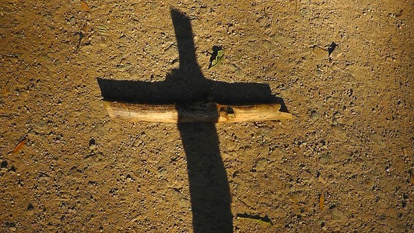 cross in sand